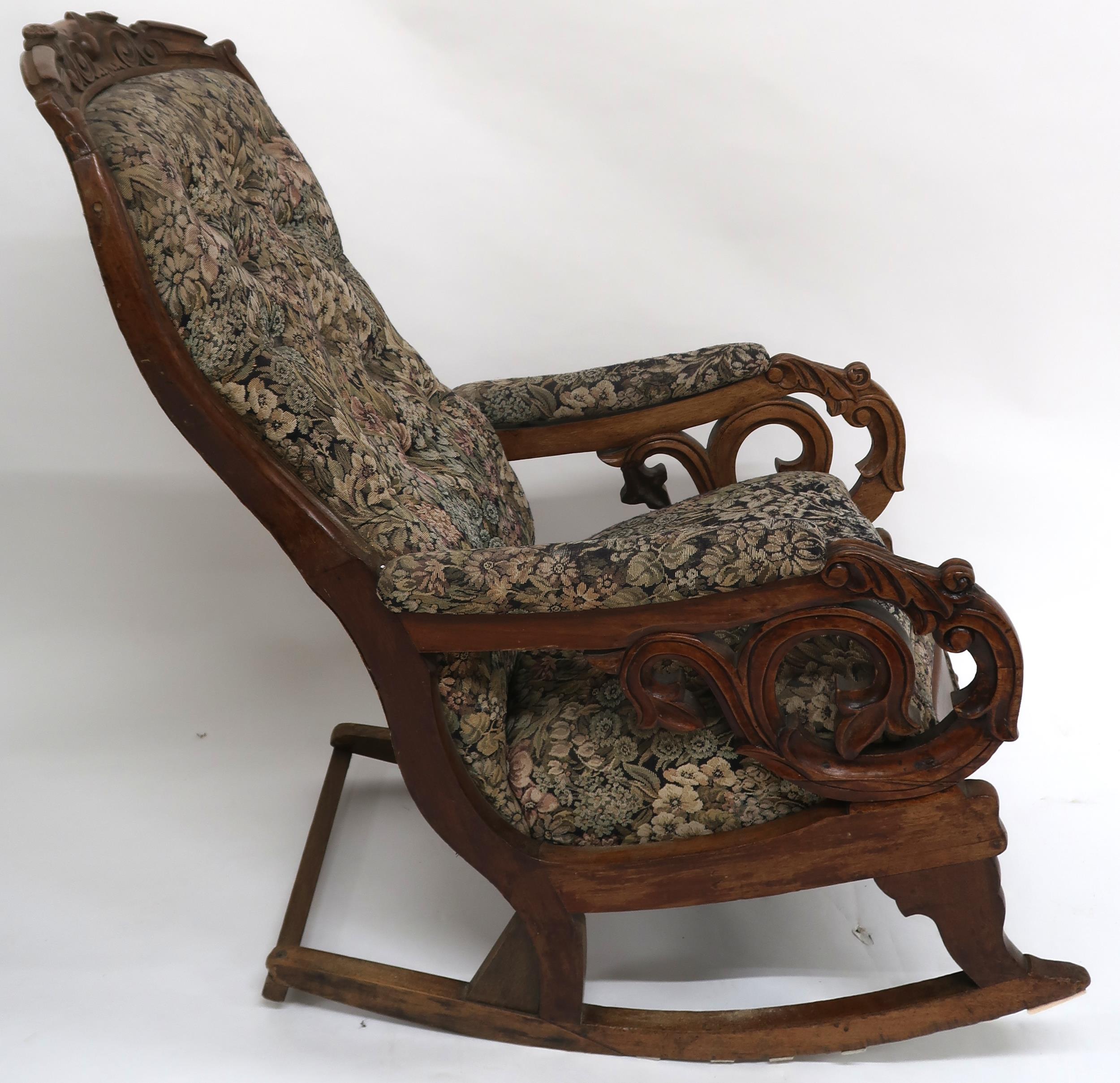 A Victorian walnut framed rocking chair with floral button back upholstery, carved scrolled arms - Image 4 of 6