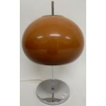 A mid 20th century plexiglass shaded table lamp in the manner of Harvey Guzzini, 50cm high x 30cm