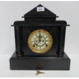 A Victorian black slate mantle clock, with Ansonia Clock Co movement sated 14 June 81 Condition