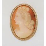 A 9ct  gold mounted shell cameo of a maiden, dimensions 4.6cm x 3.5cm, weight 10.6gms Condition