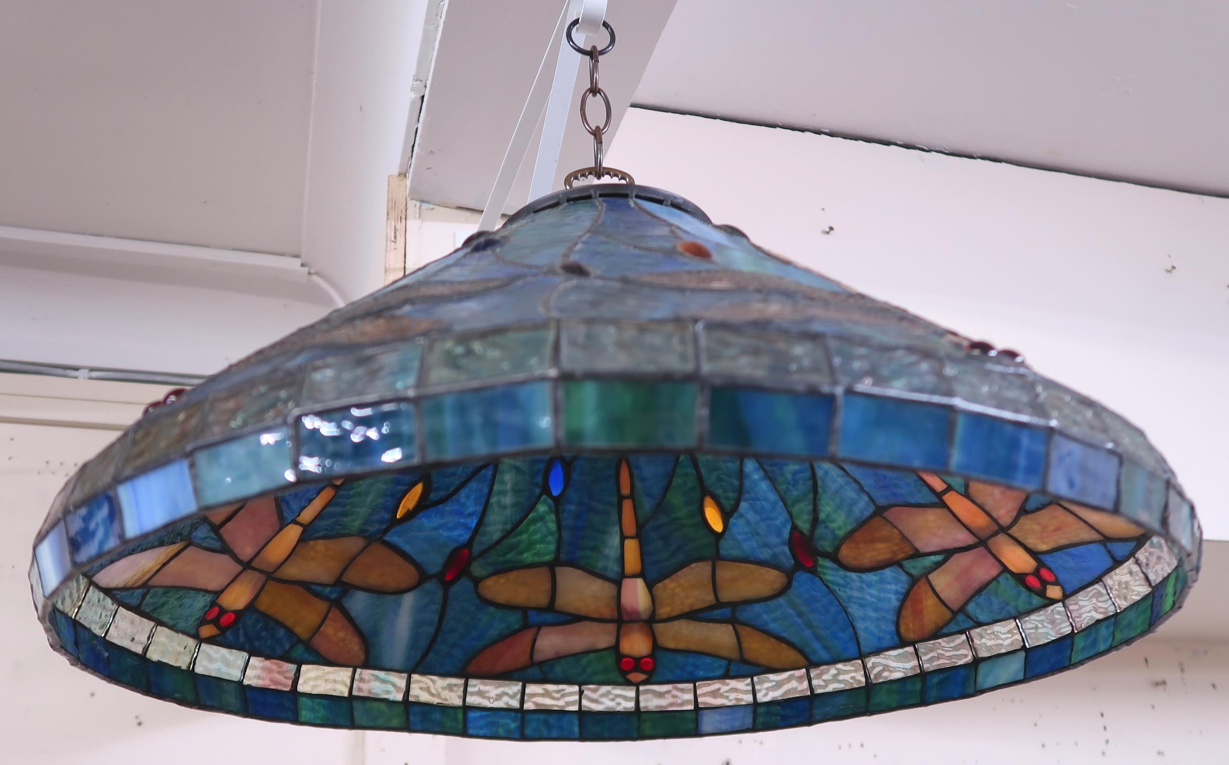 A 20th century Tiffany style stained leaded glass ceiling shade with dragonfly design, 53cm diameter