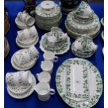 A Gladstone China Montrose pattern tea and dinner service, together with a John Russell designed