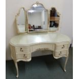 A 20th century continental style white painted kidney shaped triple plate dressing table, 146cm high