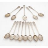 A set of eight Scottish provincial silver pointed end tea spoons, numbered and monogrammed, by