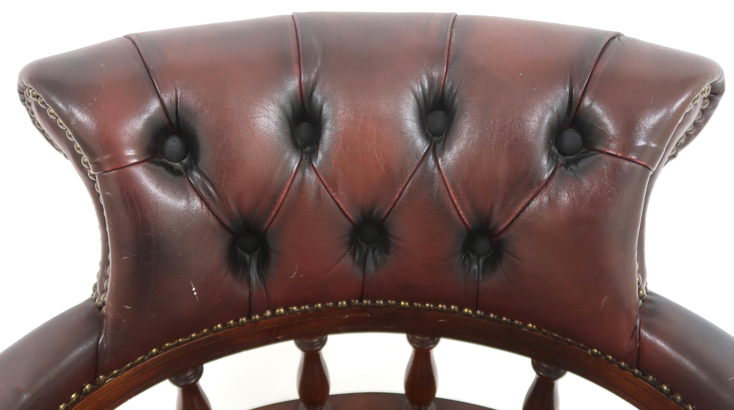 A 20th century oxblood leather upholstered revolving "captain's" desk chair, 85cm high x 63cm wide x - Image 2 of 7