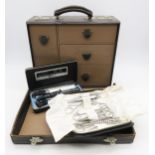 A multi-drawer doctor's case, with two cased sets of medical implements Condition Report:Available