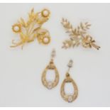 Two 9ct gold pearl set brooches, together with a pair of diamond accent drop earrings, weight