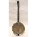 A four string tenor banjo, 19 frets, British Made to the headstock and foliate engraved resonator
