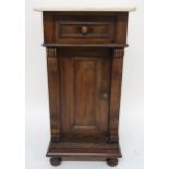 A Victorian mahogany marble topped bedside cabinet with single drawer over single cabinet door on