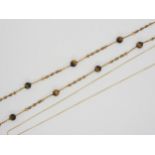 A  9ct gold fancy neck chain strung with tiger's eye beads, by Joseph Cook & Son length 60cm,
