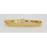 A yellow metal bracelet, length approx 18cm, weight 9.6gms Condition Report:Available upon request