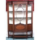 An Edwardian mahogany and satinwood inlaid display cabinet with moulded cornice over single glazed