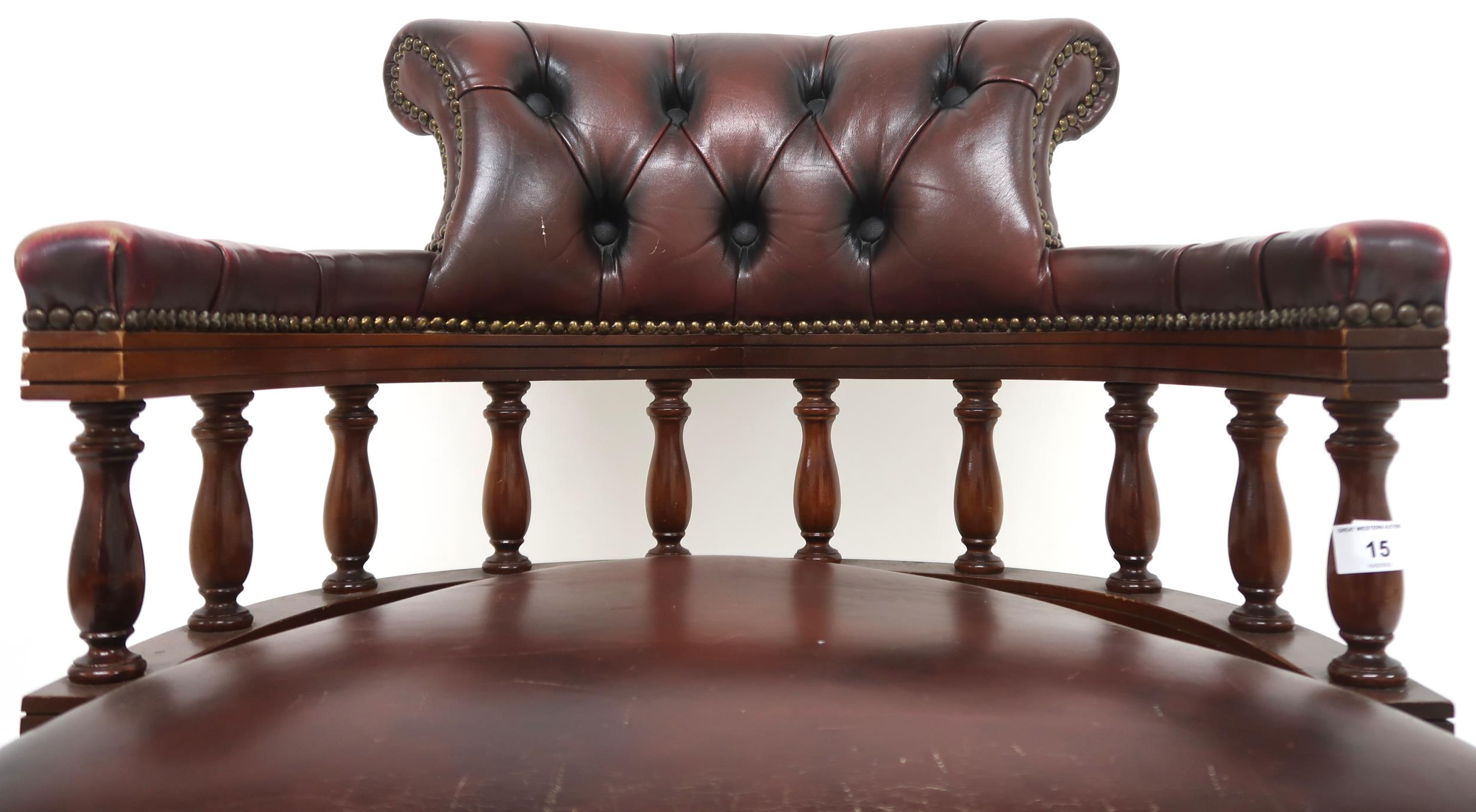 A 20th century oxblood leather upholstered revolving "captain's" desk chair, 85cm high x 63cm wide x - Image 3 of 7