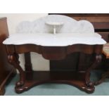 A Victorian mahogany washstand with serpentine marble top over single drawer on cabriole supports on