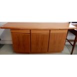 A mid 20th century Danish teak Gangso Mobler sideboard with tile inset slide over three drawers over