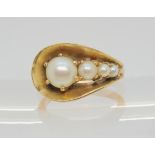 A 14K gold pearl ring, signed Kimberly, largest pearl approx 6.6mm, finger size L, weight 5.5gms