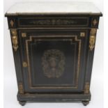 A Victorian ebonised marble topped peer cabinet with foliate patterned brass inlaid single door with