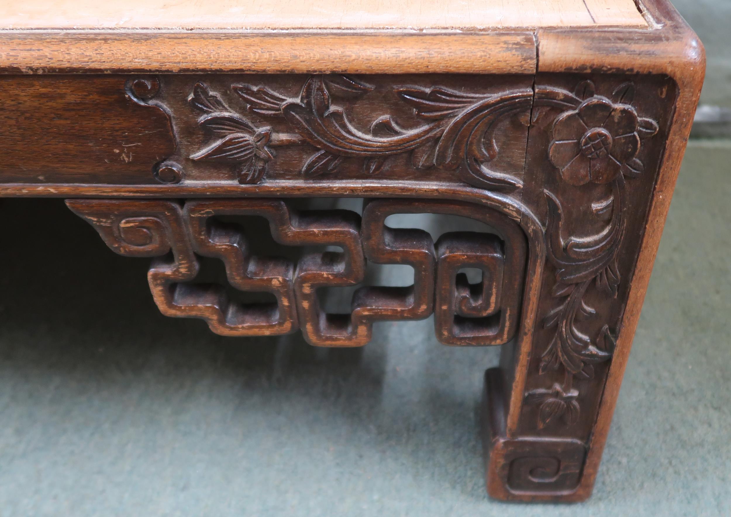 A 19th century Oriental hardwood low coffee table with extensively carved fretwork friezes on shaped - Image 5 of 8