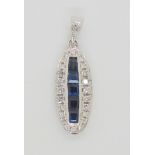 An 18ct white gold sapphire and diamond pendant, set with estimated approx 0.30cts of brilliant