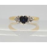 A 9ct gold heart shaped sapphire and diamond cluster ring, size I1/2, weight 2.1gms Condition