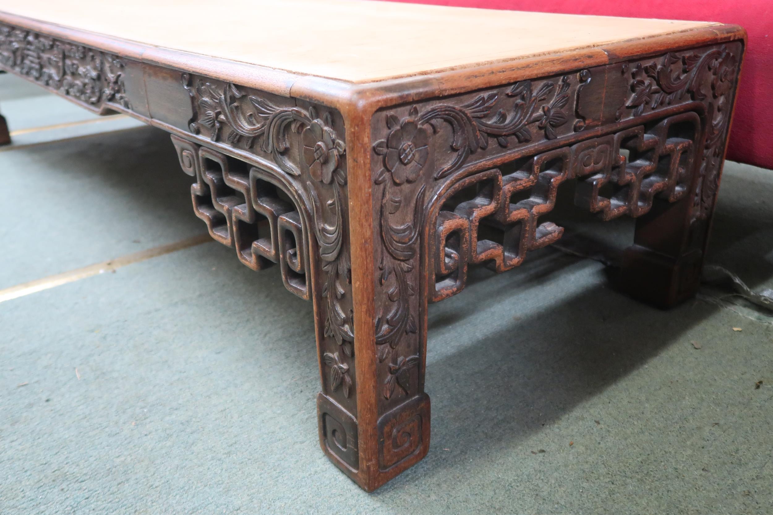 A 19th century Oriental hardwood low coffee table with extensively carved fretwork friezes on shaped - Image 4 of 8