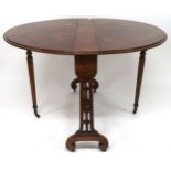 A Victorian burr walnut John Taylor & Son Edinburgh drop end oval Sutherland style table, 73cm