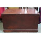 A late Victorian stained pine blanket chest on plinth base, 57cm high x 100cm wide x 59cm deep