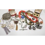 A collection of vintage costume jewellery to include Murano glass beads, a butterfly necklace and