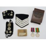 A WW2 Defence Medal and War Medal pair, in original packaging addressed to "P. Bannerman, Esq.,