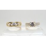 Two 14k gold cubic zirconia rings, solitaire ring size O1/2, five stone O1/2, weight together 7.1gms