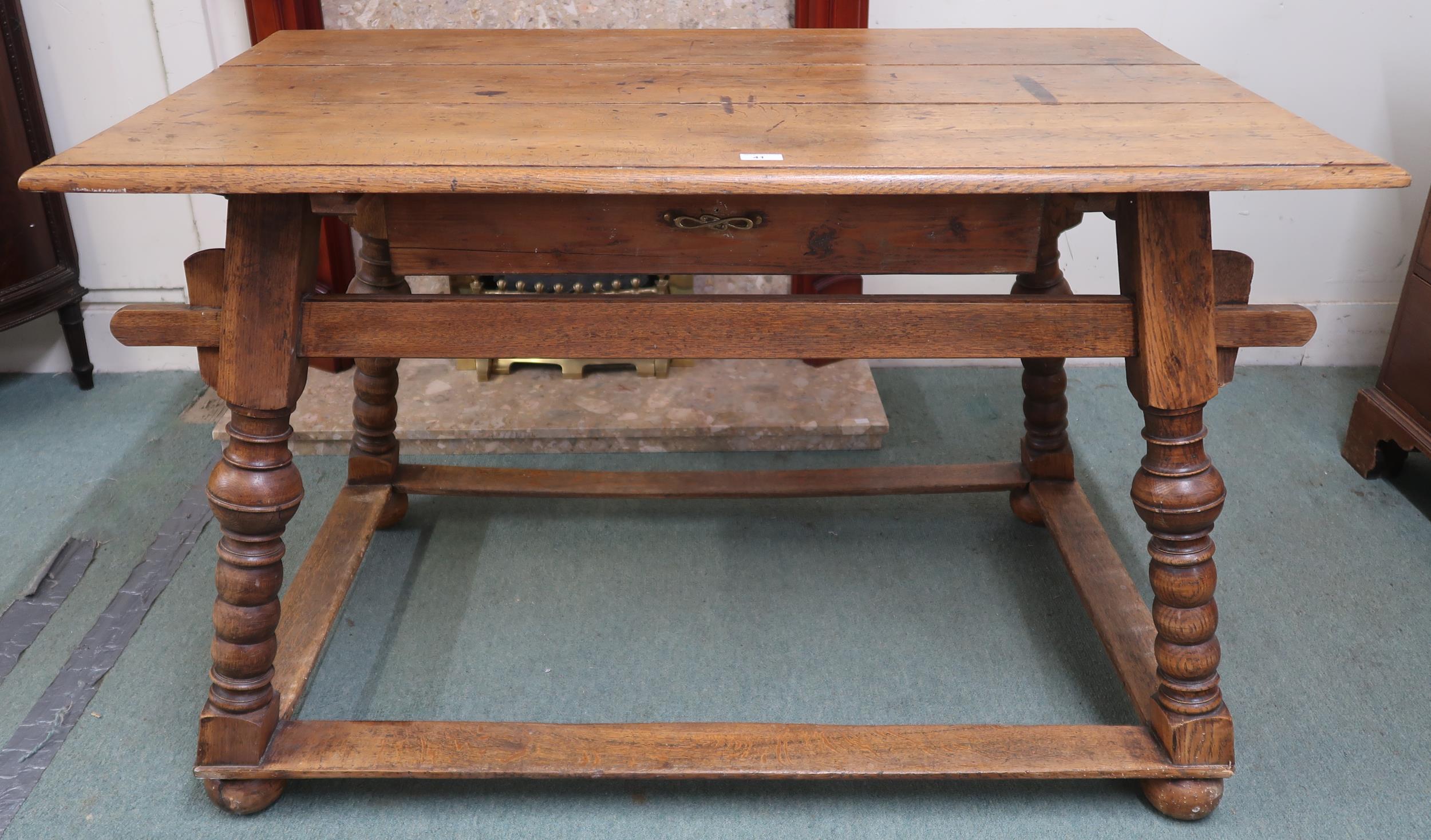 A 18th/19th oak continental table with rectangular top with single drawer on stretchered turned