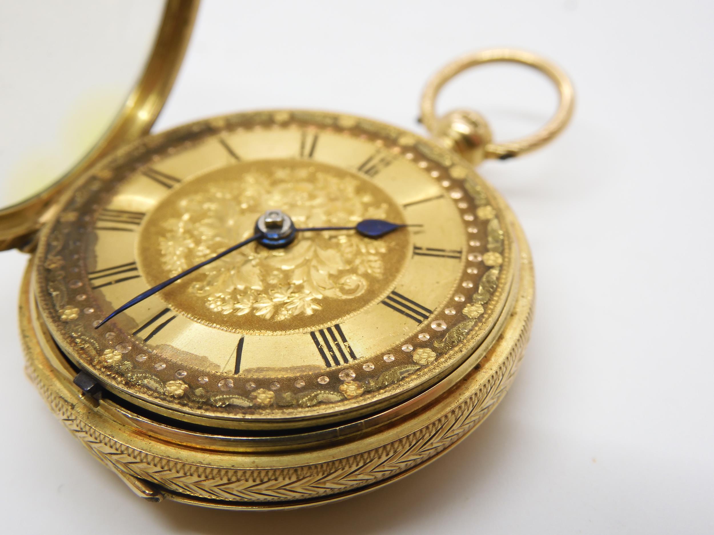 An 18ct gold open face fob watch with decorative gold dial, weight including mechanism 50.1gms, - Image 5 of 6