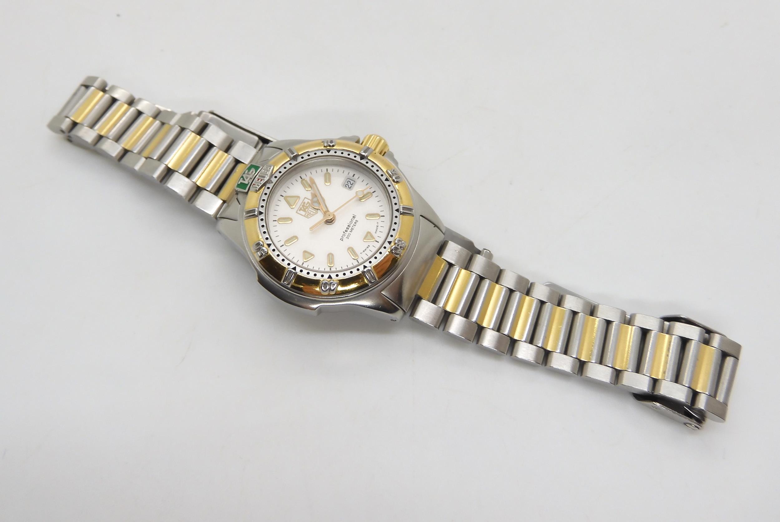 A ladies Tag Heuer Professional with original box and spare link  Condition Report:Available upon - Image 2 of 4