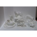 A collection of white glazed Royal Doulton Images sculptures including Running Free, A New Life, The