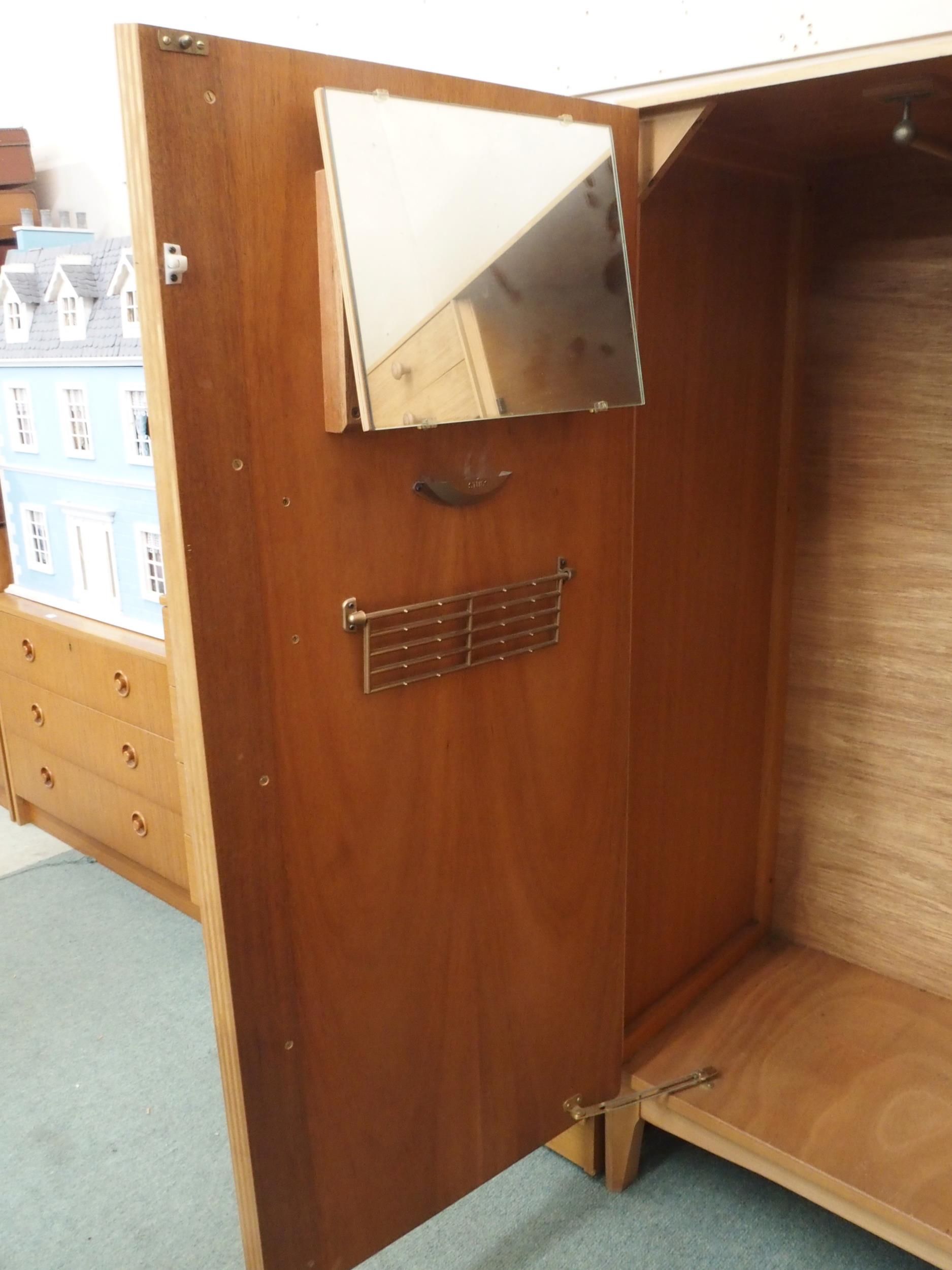 A mid 20th century teak veneered Remploy bachelors wardrobe, 135cm high x 90cm wide x 47cm deep - Image 3 of 6