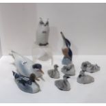 A group of Royal Copenhagen birds including a model of an owl, no 155, a duck, no 119, a Tern, no