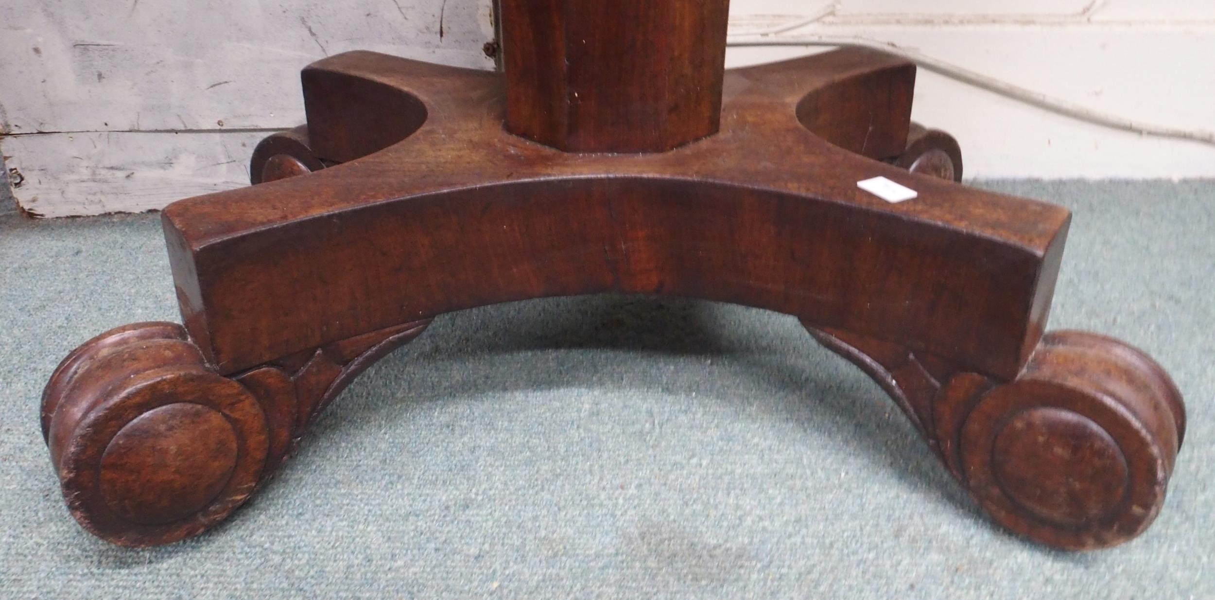 A Victorian mahogany fold-over tea table on octagonal pedestal terminating in scrolled quadrupedal - Image 2 of 4