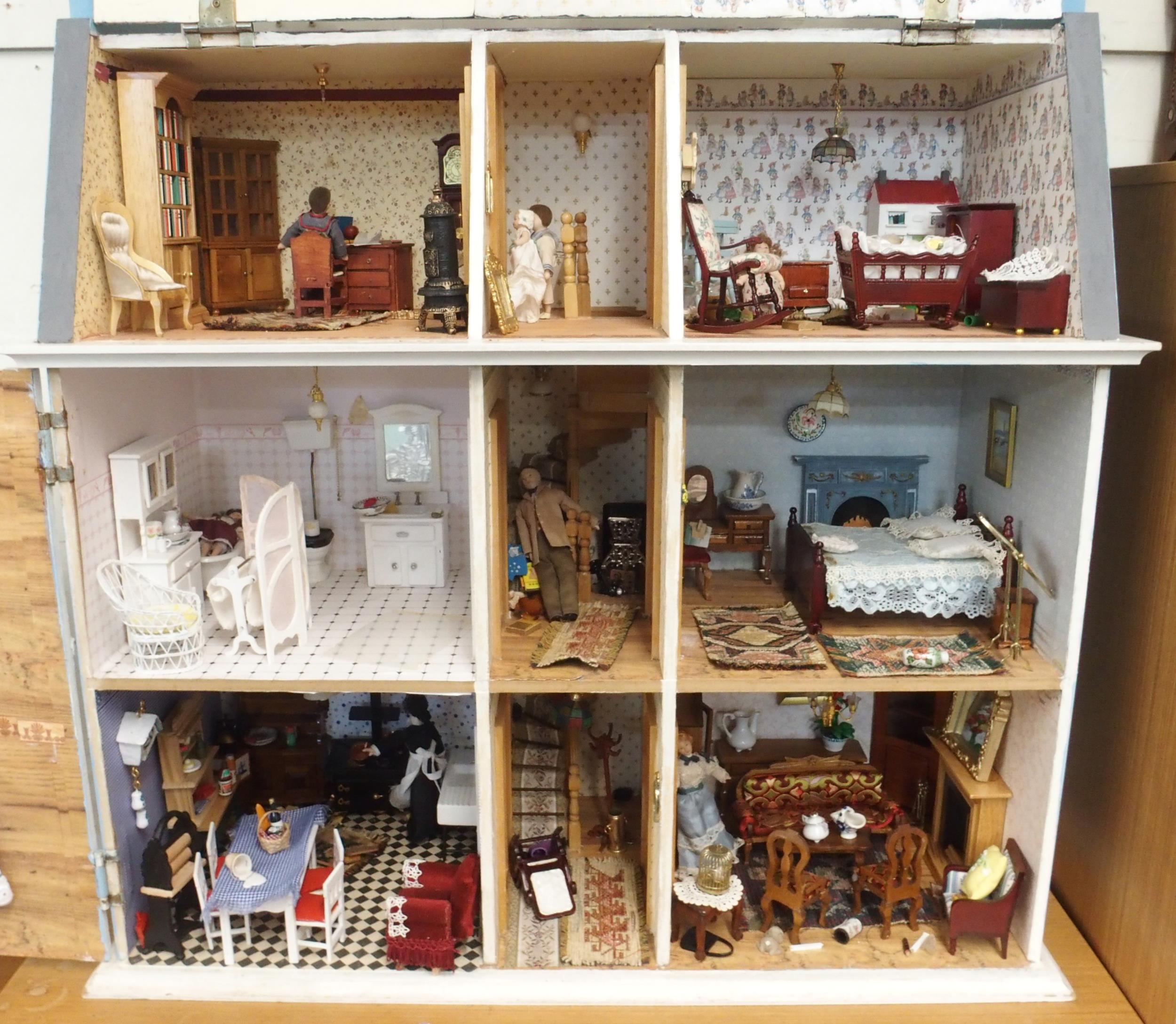 A 20th century three storey dolls house with assorted furniture and figures etc, 84cm high x 80cm - Image 3 of 13