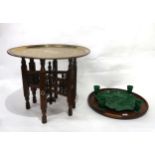 Peking glass hors d'oeuvres dishes on wooden tray, together with a brass topped Indian table