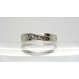 A platinum five stone diamond ring, set with estimated approx 0.10cts of brilliant cuts,  size O,