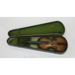 A 19th century two piece back violin 35cm with a bow and wood case Condition Report:Available upon