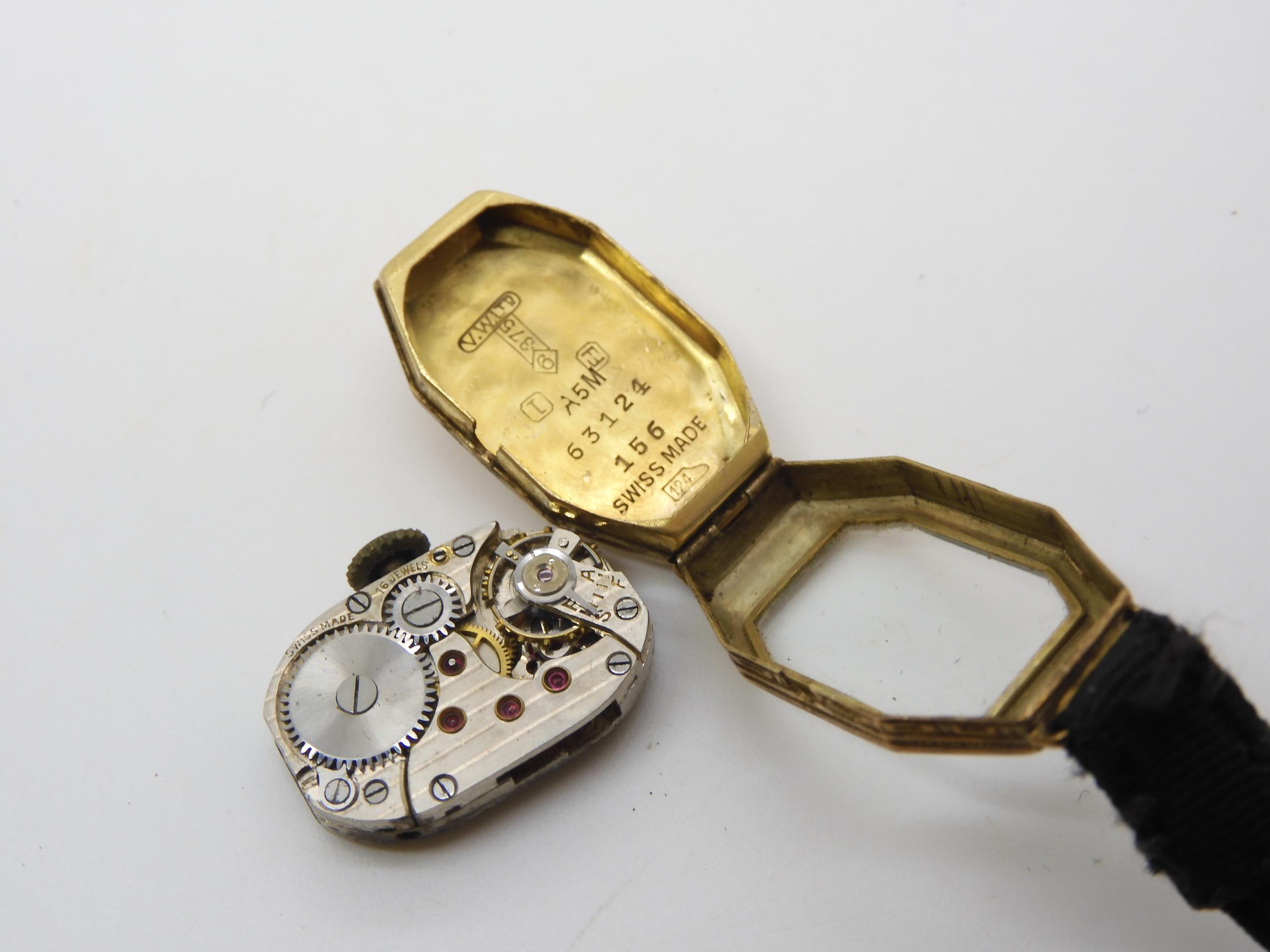 An 18ct gold open face fob watch with decorative gold dial, weight including mechanism 50.1gms, - Image 6 of 6