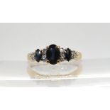 A 9ct gold sapphire and diamond cluster ring, size P, weight 1.8gms Condition Report:Available