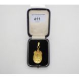 A 9ct gold Golfing medallion made by James Fenton hallmarked Birmingham 1936. Weight 7.8gms