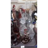 A collection of antique glassware including a set of three ruby flashed and glass bottle