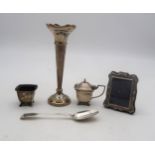 A collection of silver including a silver specimen vase (base weighted), by Harrison Brothers &