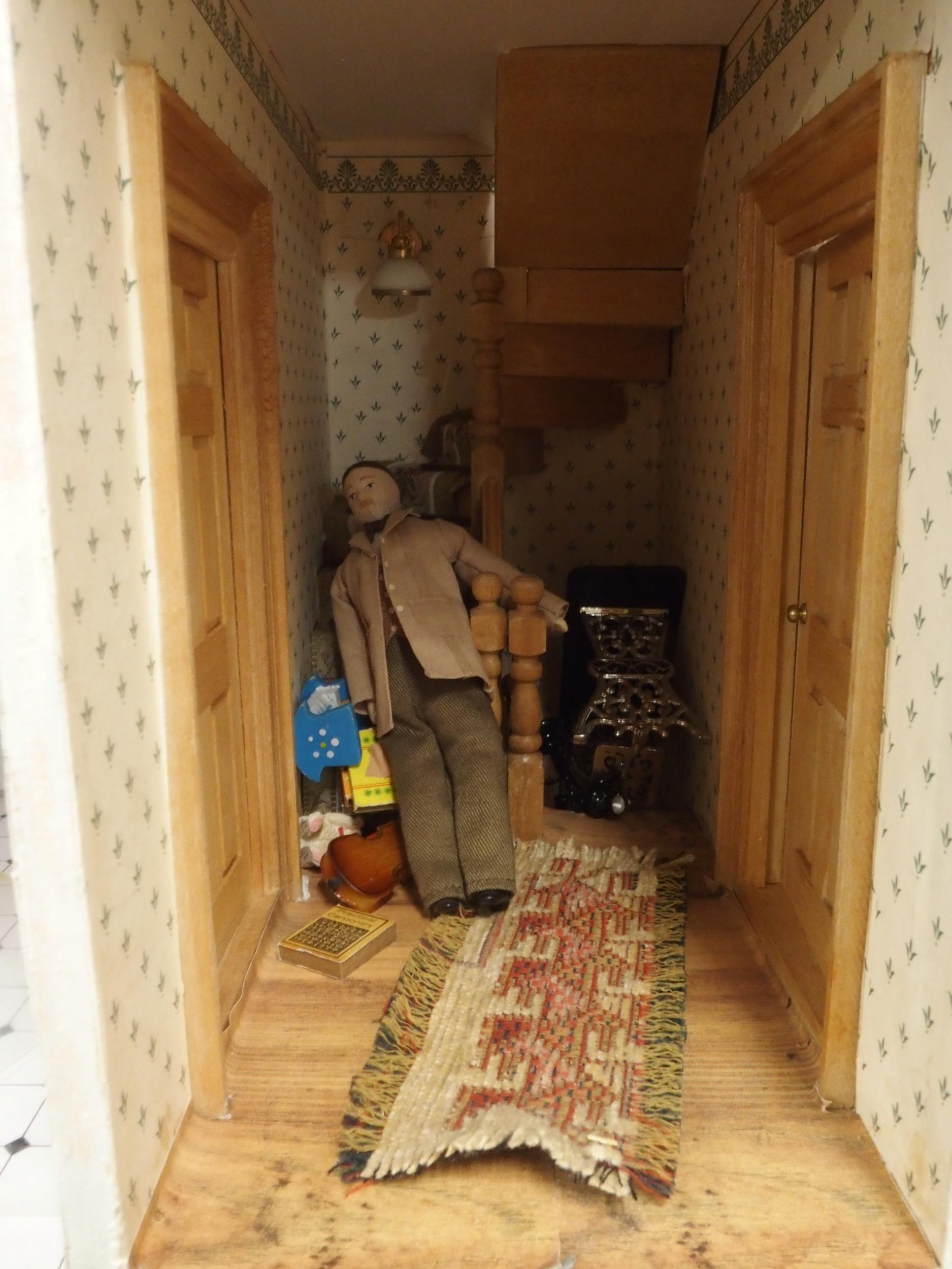 A 20th century three storey dolls house with assorted furniture and figures etc, 84cm high x 80cm - Image 8 of 13