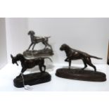 A Beswick bronzed ceramic figure of a dog, a silvered dog after Mene and a bronze of a dog with a