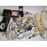 A large Miracle gem set pendant, a pewter and paua shell brooch and other items Condition Report: