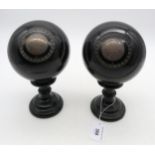 A pair of bowling trophies, formed of actual bowls by Thomas Taylor of Glasgow, each with inset